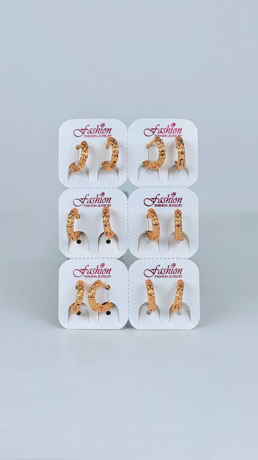 Argollas con piedreria/ figuras