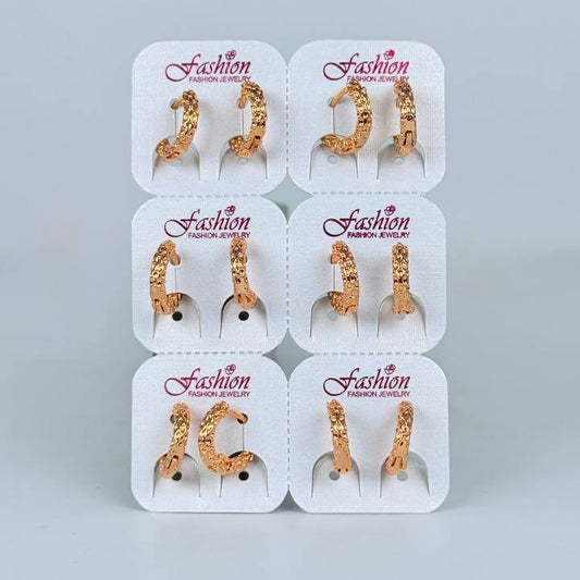 Argollas con piedreria/ figuras