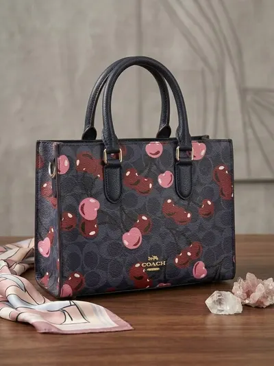 cartera coach al mayor · BIGTIME Venezuela · bandoleros