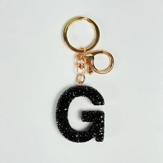 Llavero brillante de letra