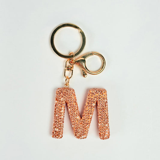 Llavero brillante de letra