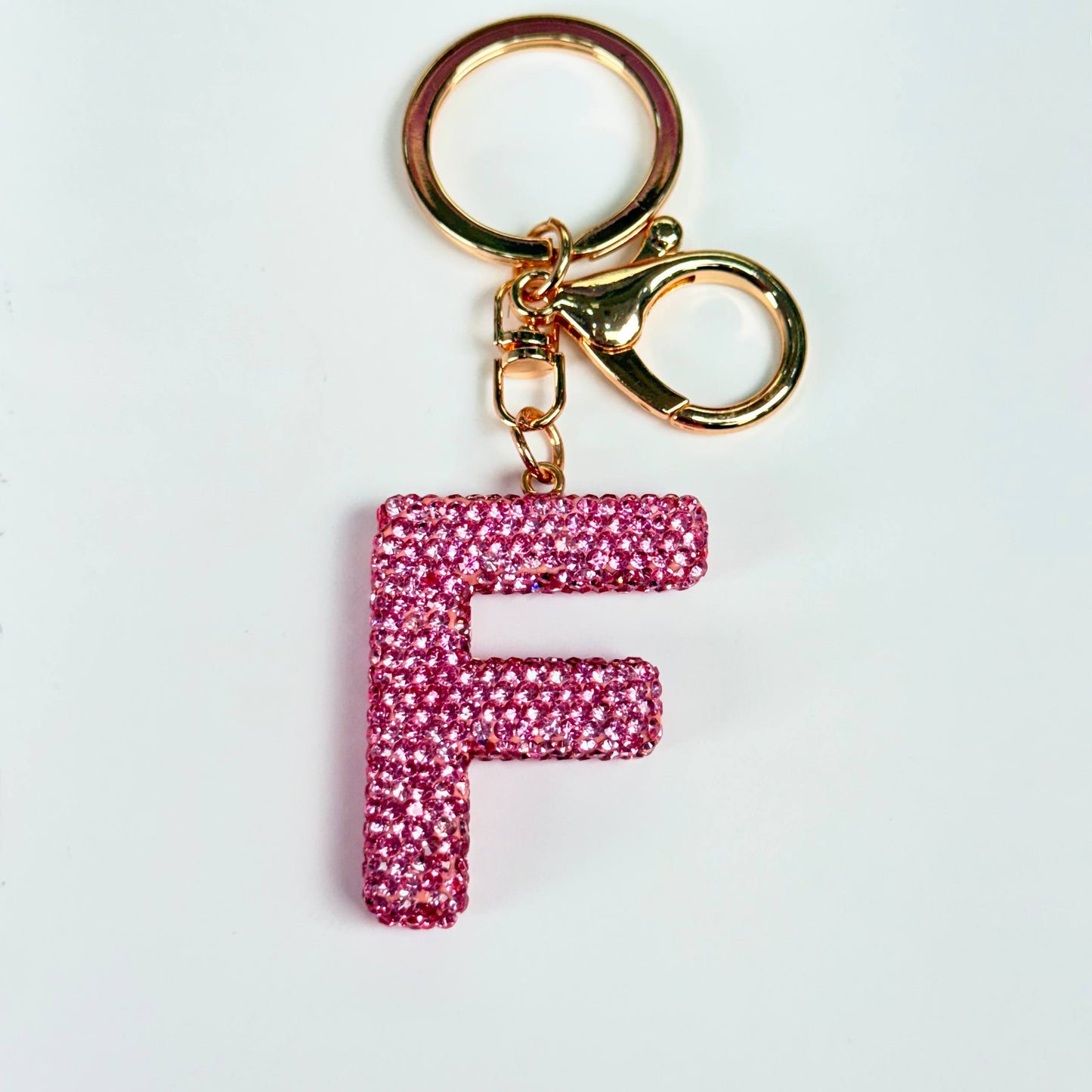 Llavero brillante de letra
