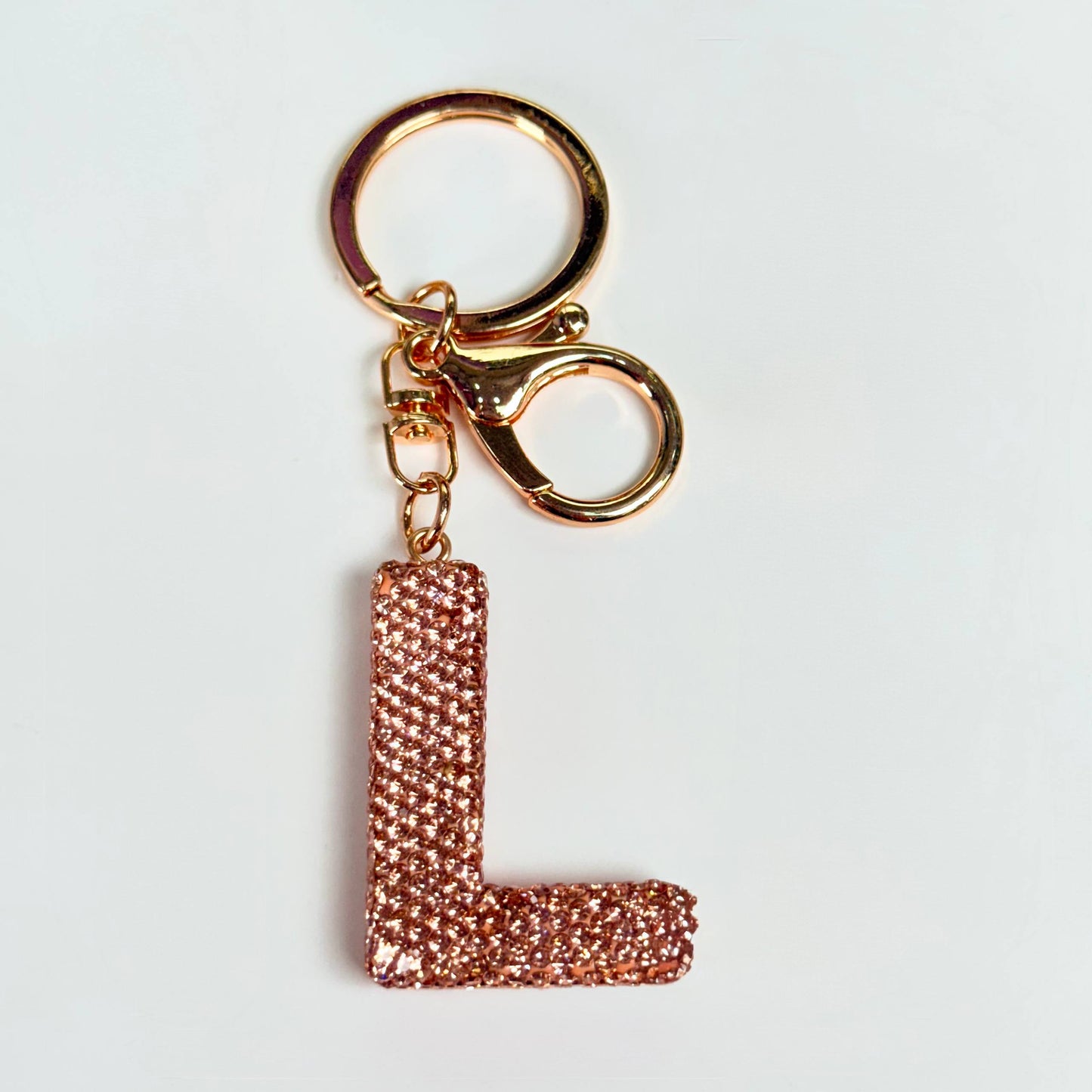 Llavero brillante de letra