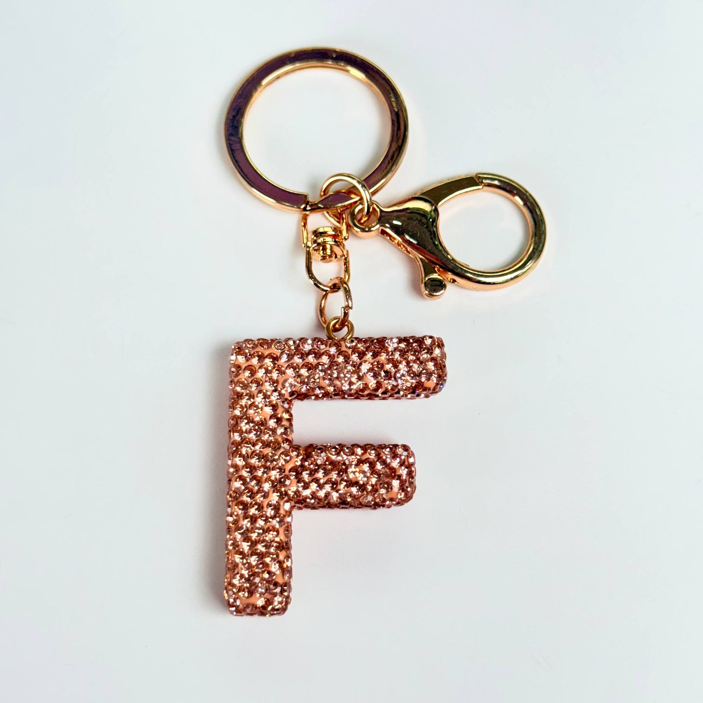 Llavero brillante de letra