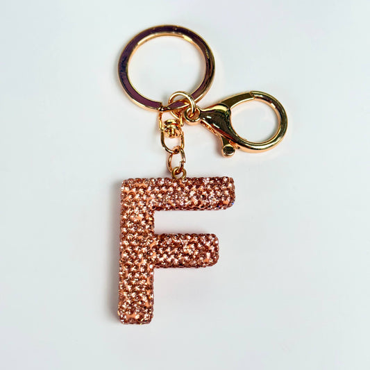 Llavero brillante de letra