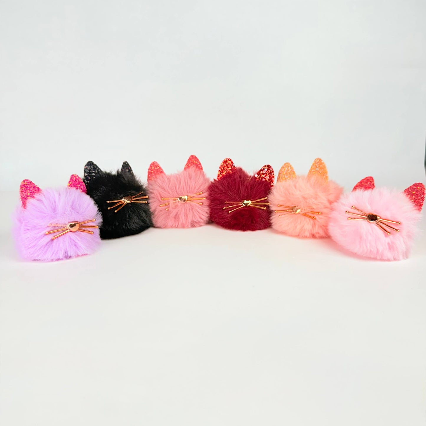 Llavero de pompón gatito