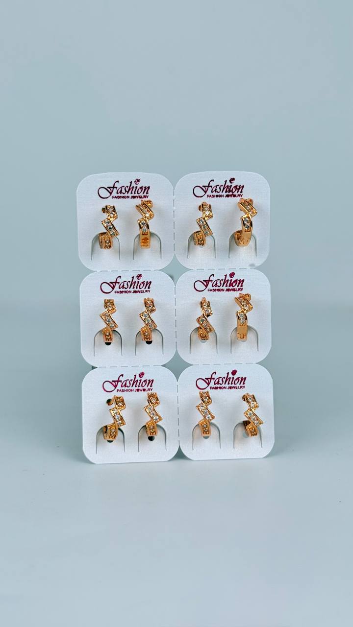 Argollas con piedreria/ figuras