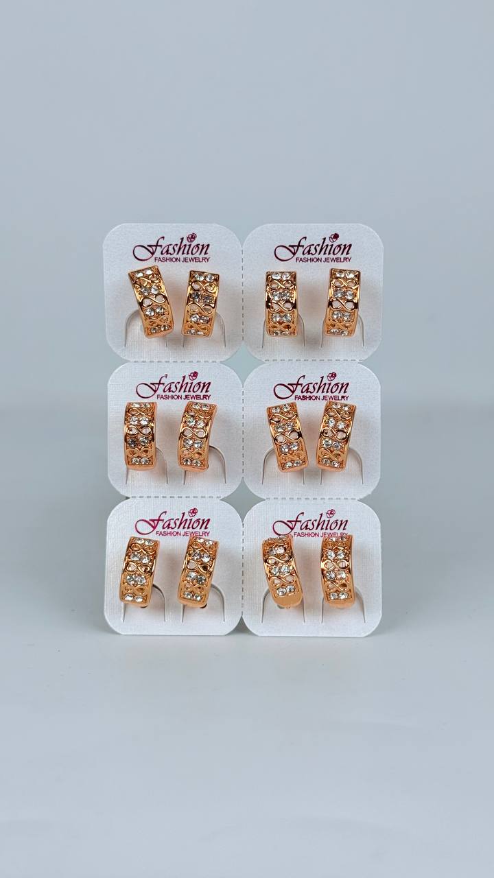 Argollas con piedreria/ figuras