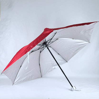 sombrilla de cartera mango blanco